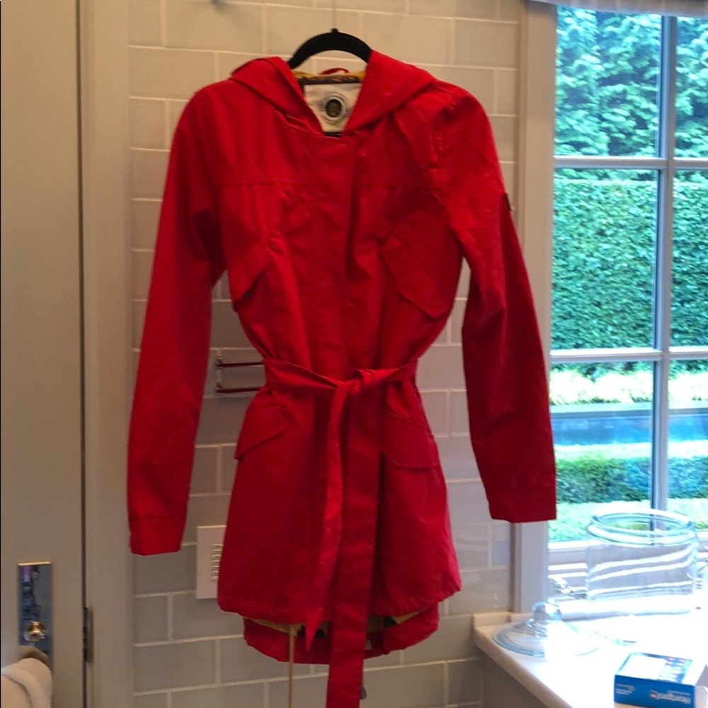 Cheery red raincoat with stylish lining and hood